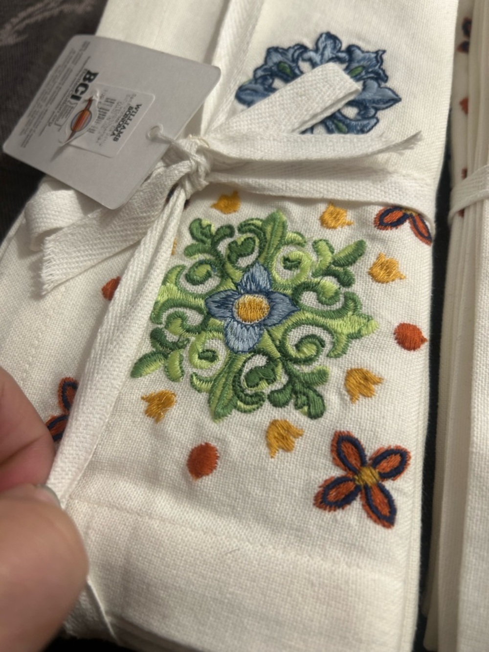 NWT Williams Sonoma White Dinner Napkins with Blue, Green and Yellow Embroidery - Picture 5 of 6